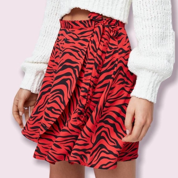 Sunday Best Dresses & Skirts - Aritzia Sunday Best Tiger Wrap Mini Skirt